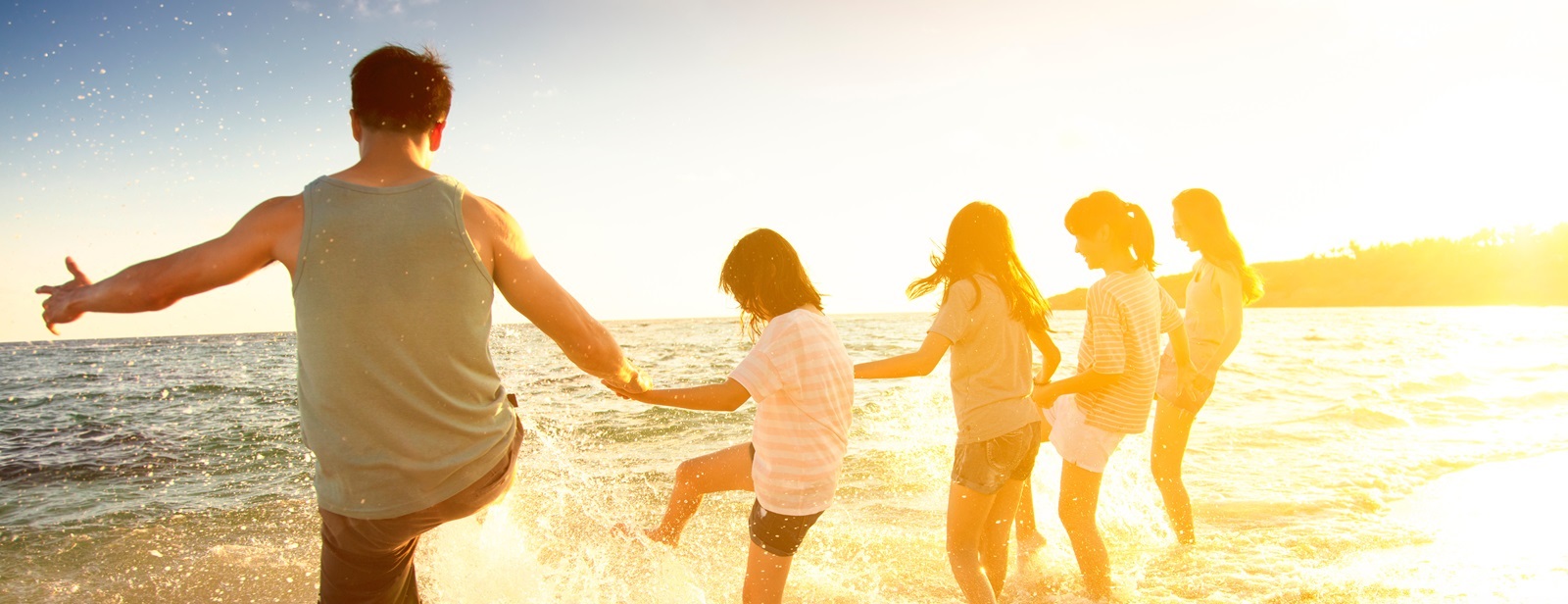 Family having fun at the beach.
